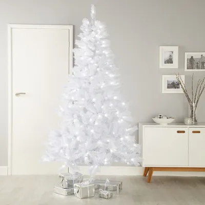 Как стильно украсить белую новогоднюю елку - статья от HolidayTree