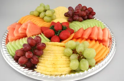 Различные вкусные фрукты на деревянном столе :: Стоковая фотография ::  Pixel-Shot Studio