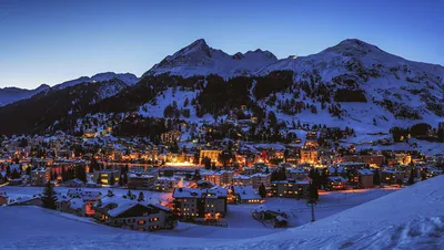 Обои для рабочего стола Швейцария Davos гора зимние снега Вечер