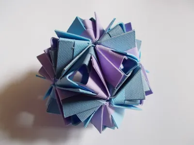 Colorfull origami kusudama from rainbow flowers isolated on white. Close up  Stock Photo - Alamy